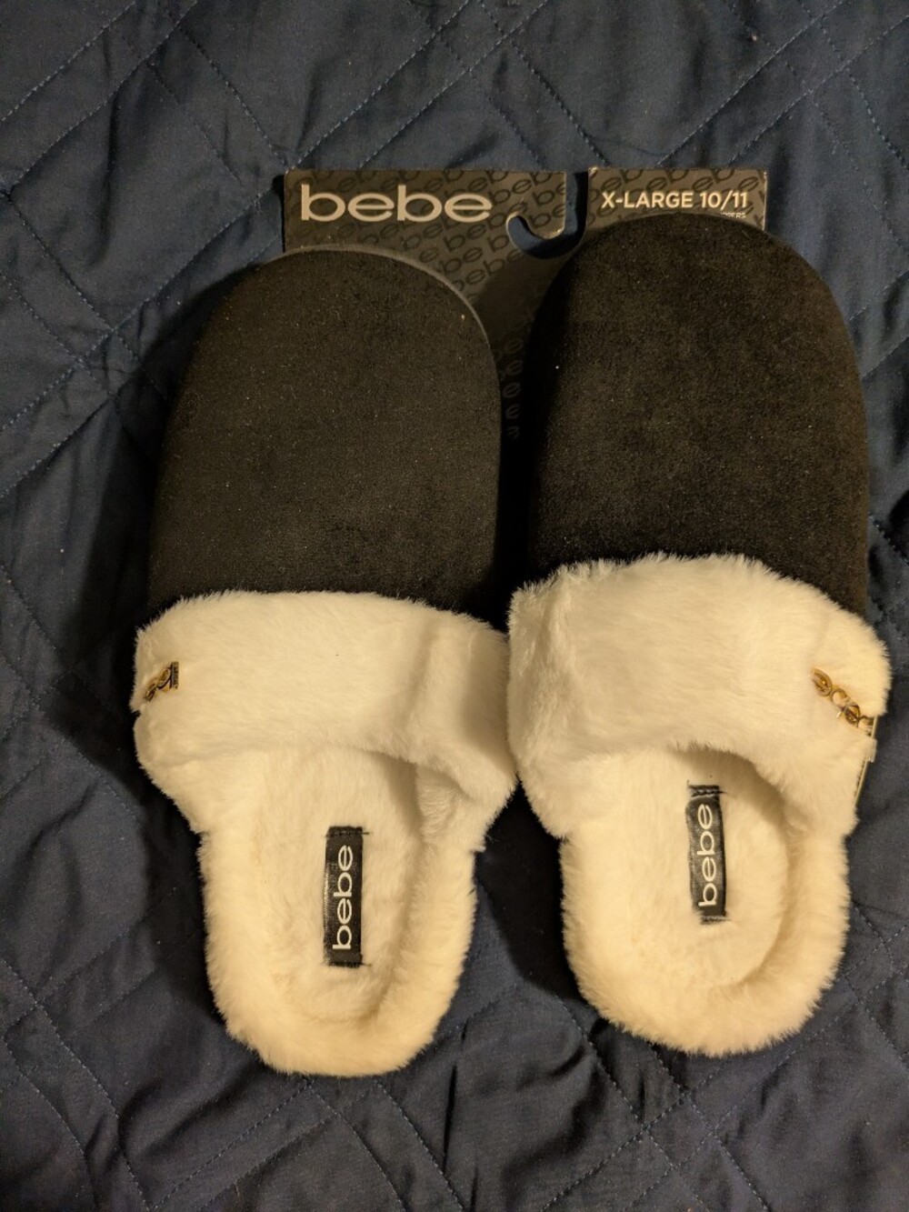 Bebe Black and Ivory Faux-Fur Slip-On Slippers with Gold Charm